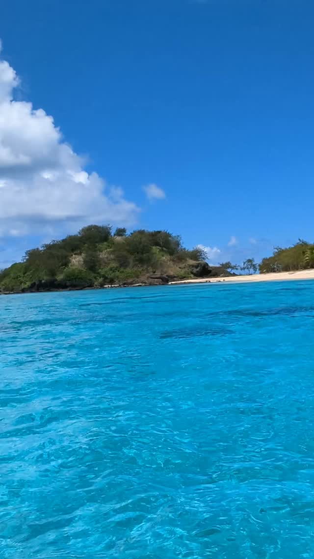 Crystal-clear waters, tropical skies and a little rain